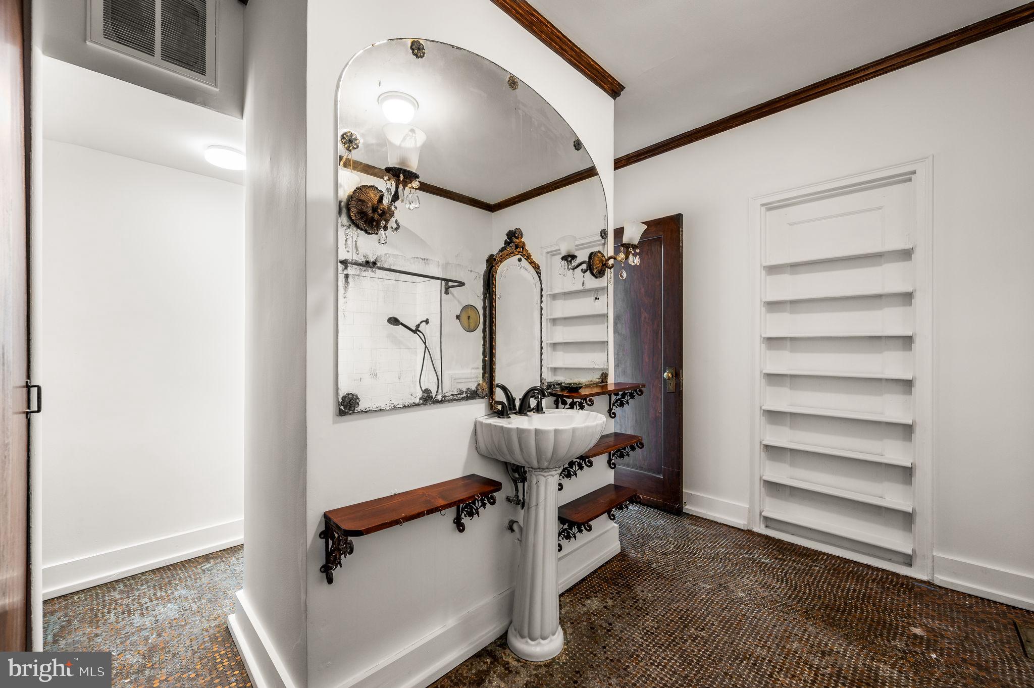 1901 Walnut Street, Unit 20B Philadelphia, PA 19103 - Photo 17 of 24 a room with gym equipment and a mirror