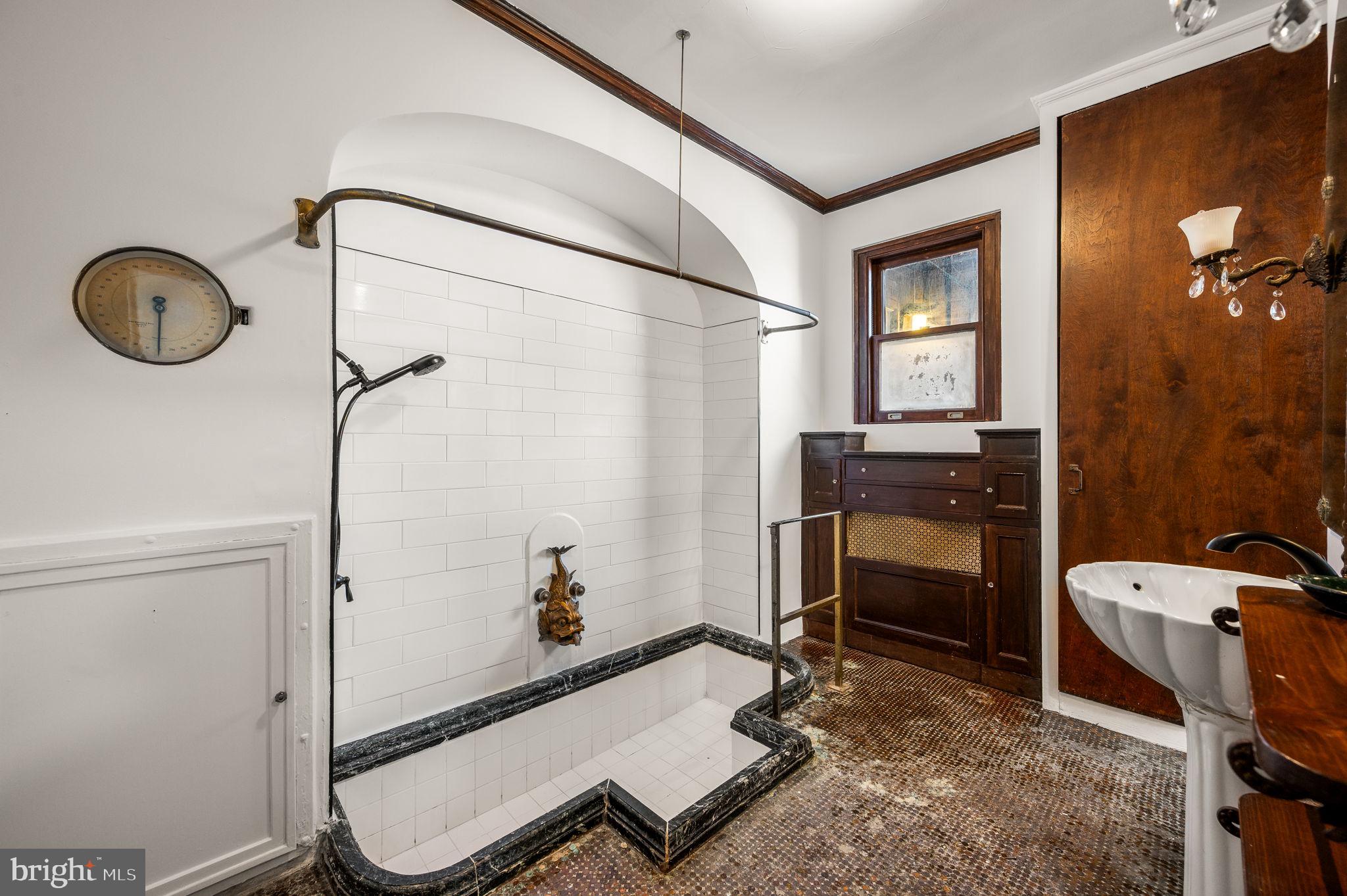 1901 Walnut Street, Unit 20B Philadelphia, PA 19103 - Photo 18 of 24 a bathroom with a sink toilet and shower