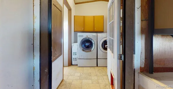 a view of storage and utility room