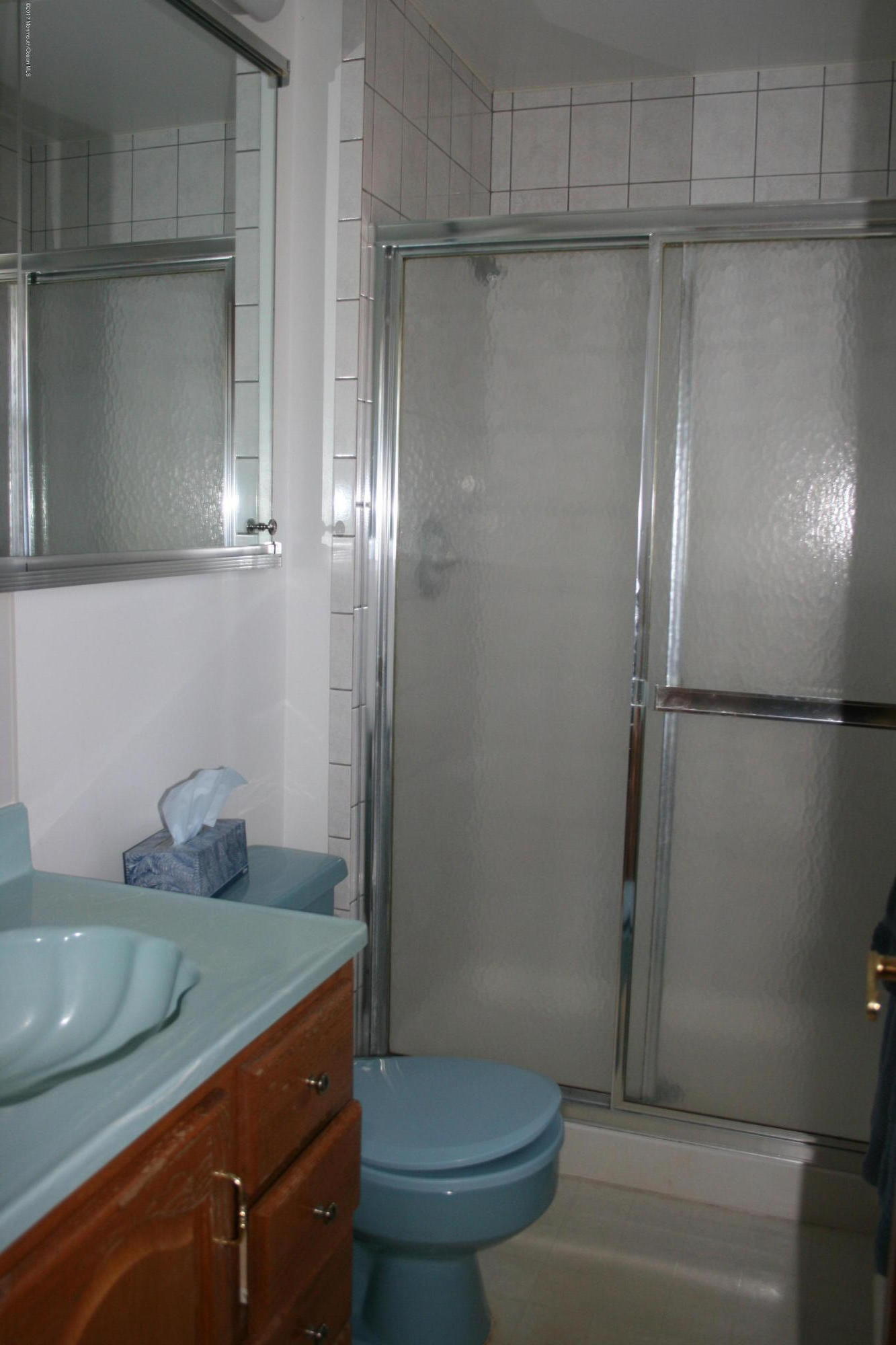 867 Monmouth Road Cream Ridge, NJ 08514 - Photo 16 of 19 a bathroom with a granite countertop sink and toilet