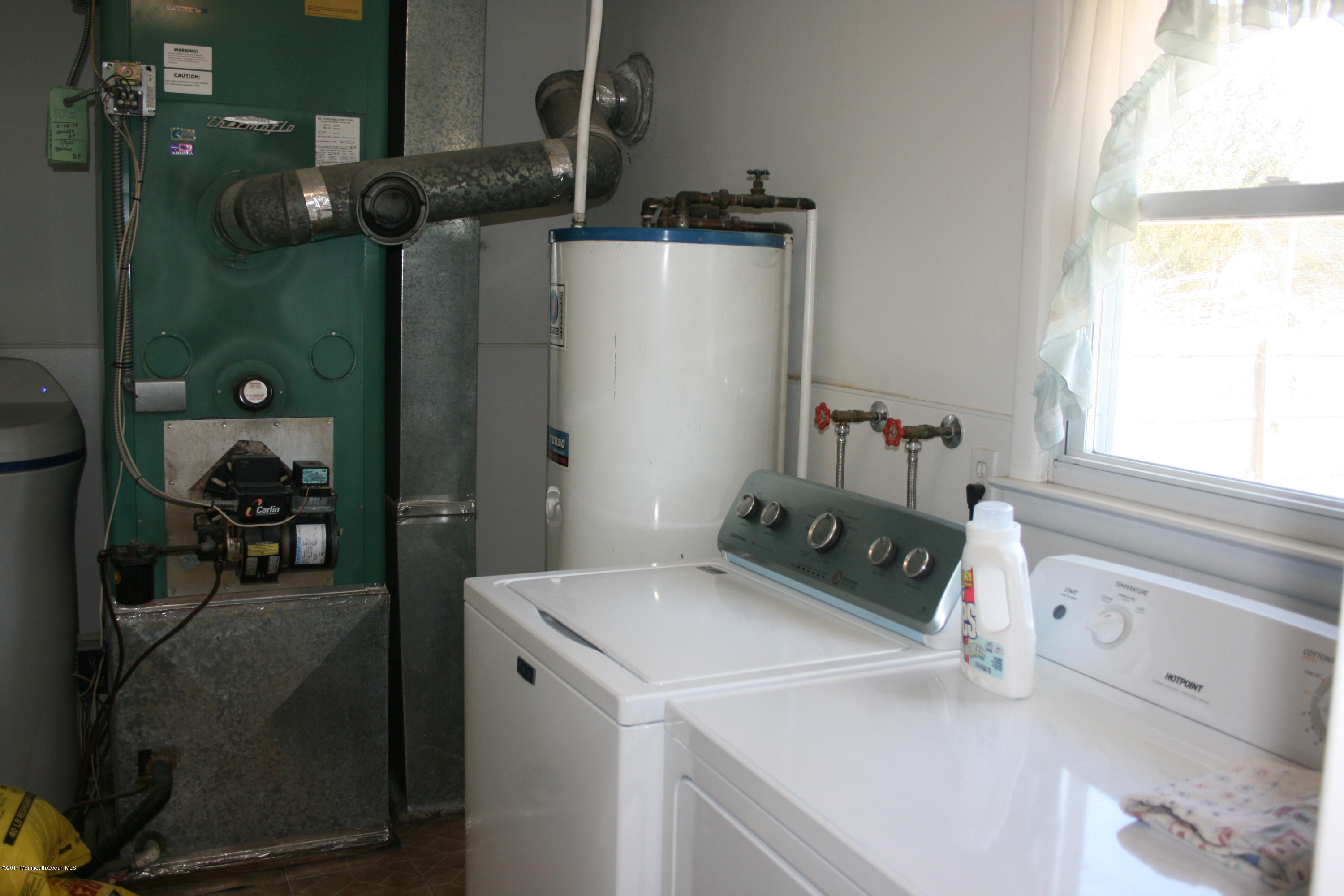 867 Monmouth Road Cream Ridge, NJ 08514 - Photo 10 of 19 a utility room with dryer and washer
