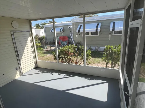 a view of a door and a porch
