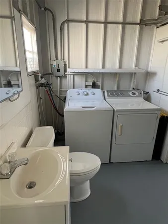 a bathroom with a sink and a toilet