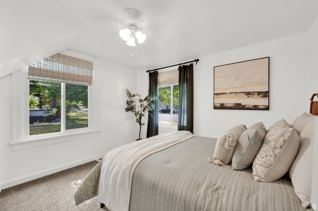 446 South 300 East Provo, UT 84606 - Photo 20 of 32 Bright bedroom with white walls and sloped ceilings