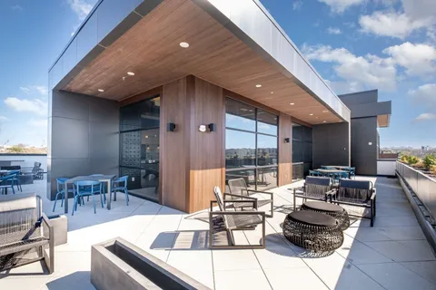 a living room with furniture and a table