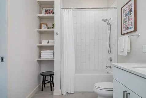 a bathroom with a sink vanity and a mirror
