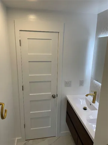 a bathroom with a bathtub and a toilet
