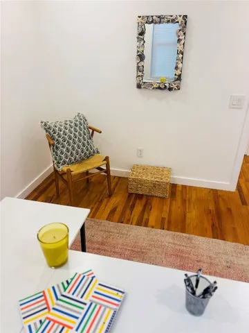 a bedroom with a bed and gym equipment