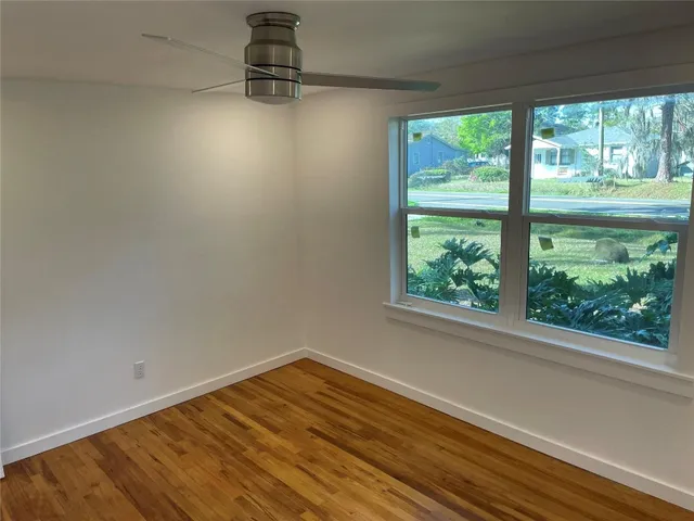 a backyard of a house with lots of green space