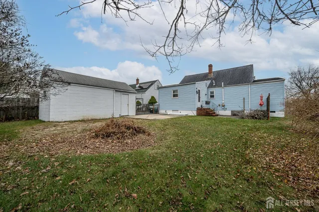 a house view with a backyard space