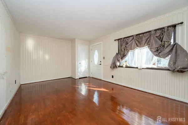 a kitchen with stainless steel appliances a refrigerator and a stove