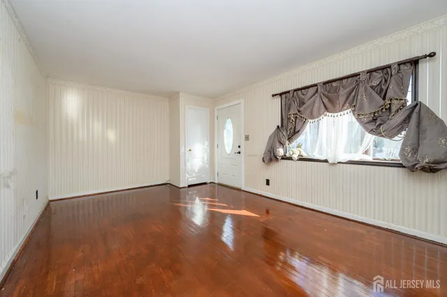 a kitchen with stainless steel appliances a refrigerator and a stove