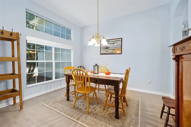 a view of a dining room with furniture