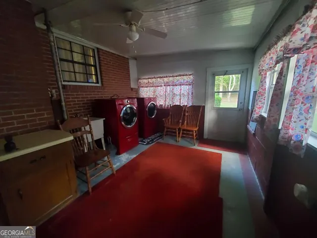 a view of livingroom with furniture and windows