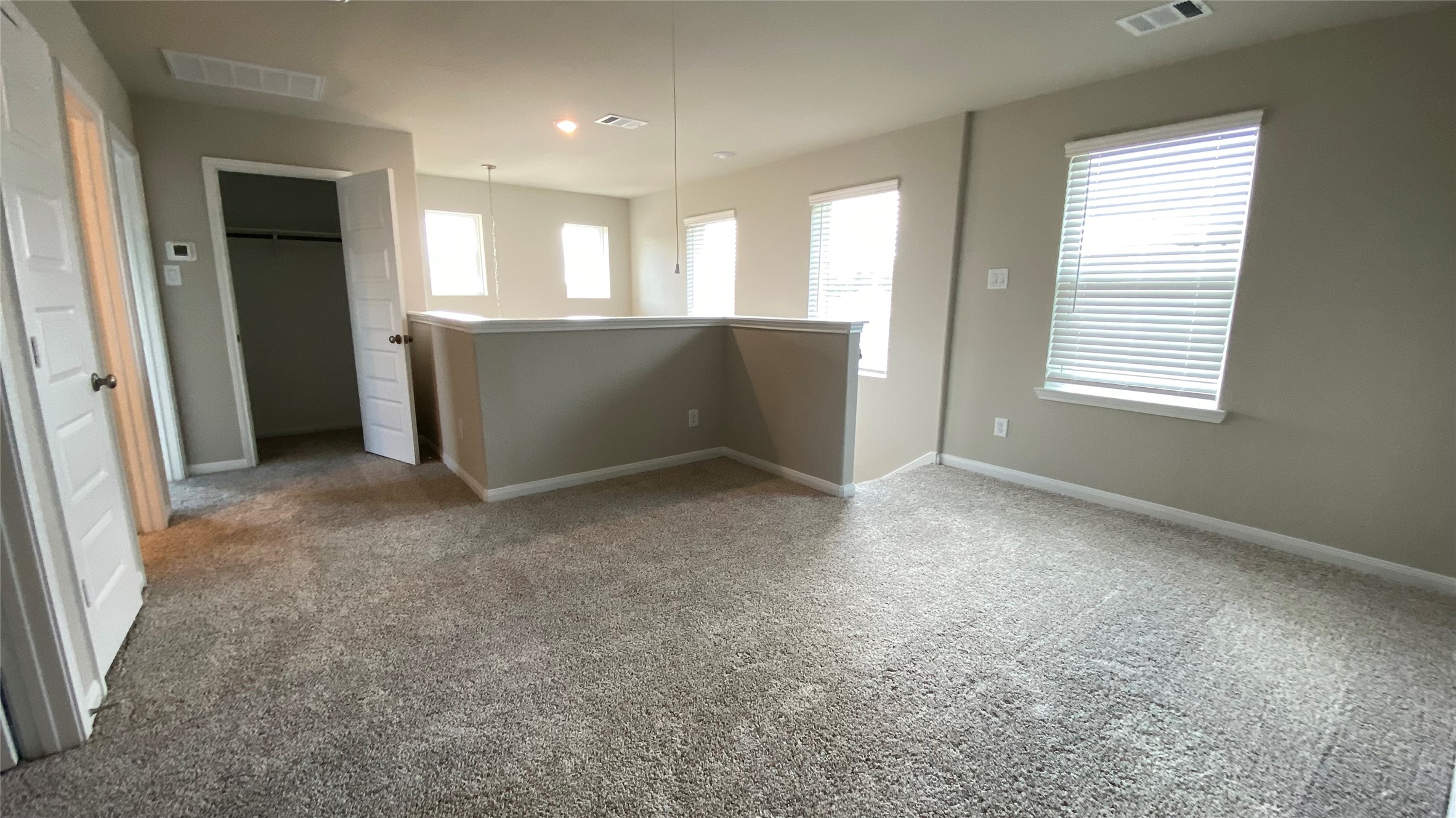 7059 Silverleaf Oak Street Conroe, TX 77304 - Photo 26 of 29 a view of an empty room with a window