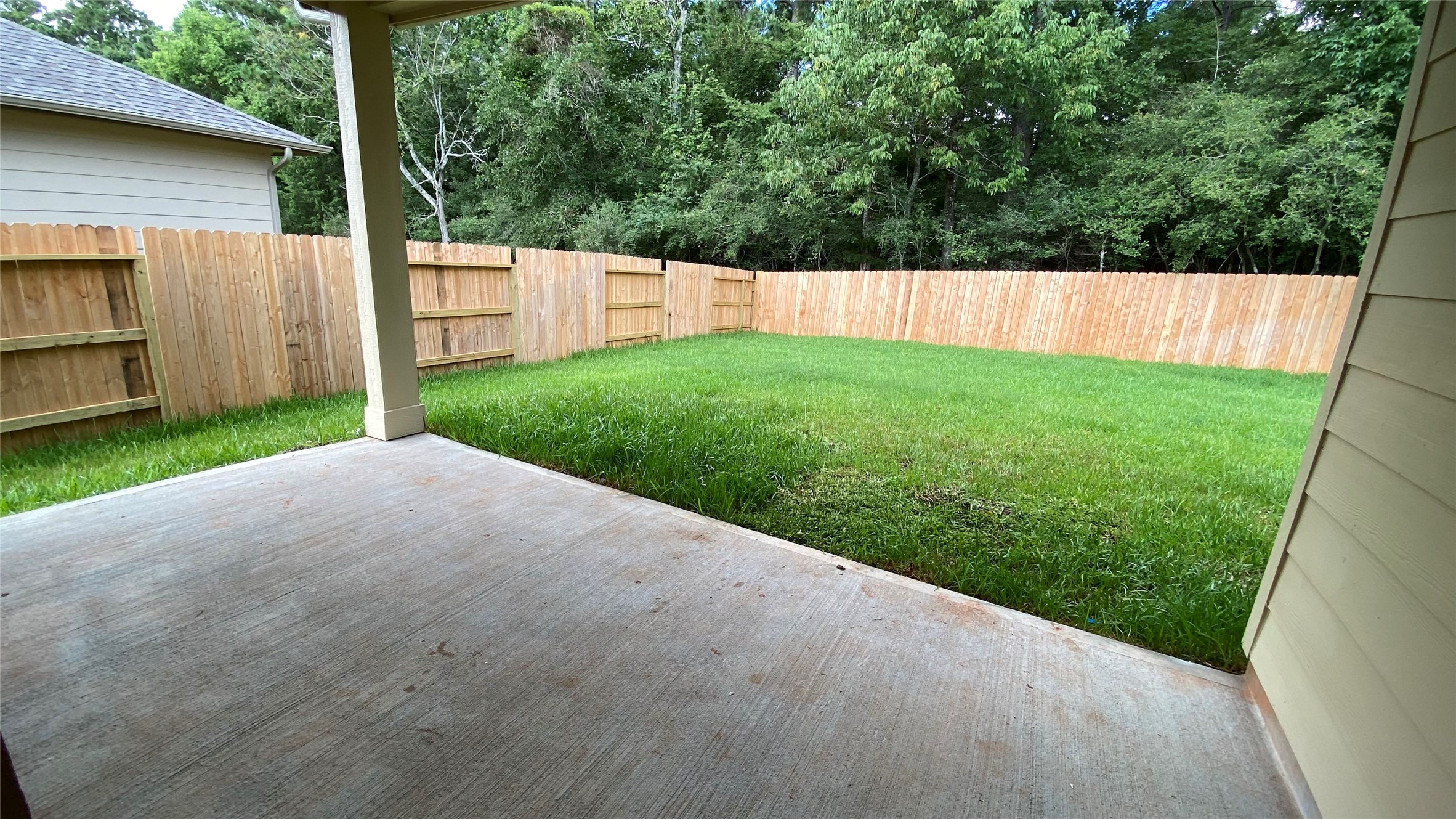 7059 Silverleaf Oak Street Conroe, TX 77304 - Photo 28 of 29 a view of backyard with green space