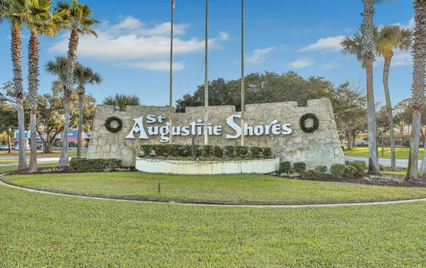 a view of a park with palm trees