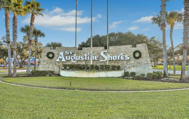 a view of a park with palm trees