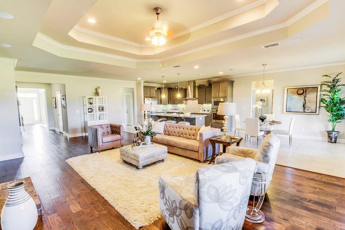 405 Chickadee Street Crestview, FL 32539 - Photo 4 of 16 a living room with furniture and a wooden floor