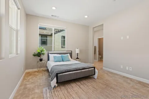 a bathroom with a shower and a mirror