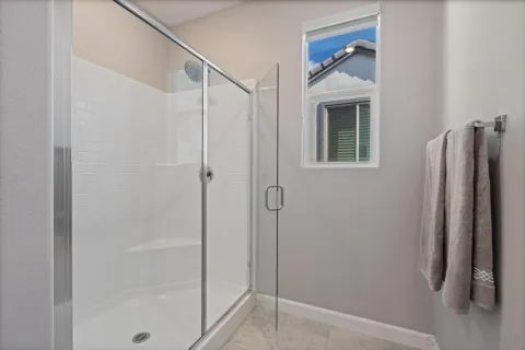 a view of a house with a large window