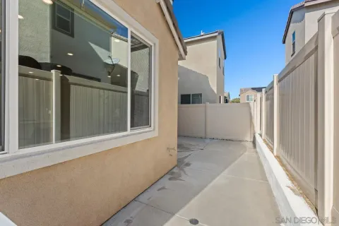 an aerial view of a house with outdoor space