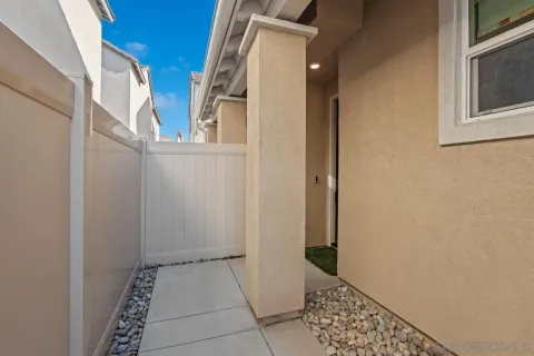 a kitchen with stainless steel appliances a sink stove and cabinets