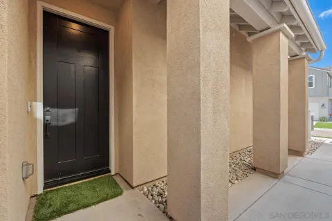 a kitchen with a sink appliances and cabinets