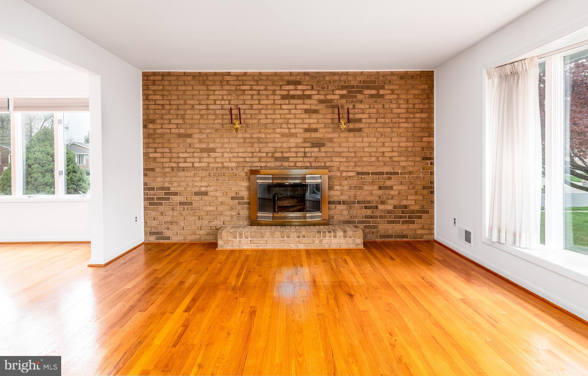 9209 Gardenia Road Baltimore, MD 21236 - Photo 8 of 34 Beautiful Wood Burning Fireplace