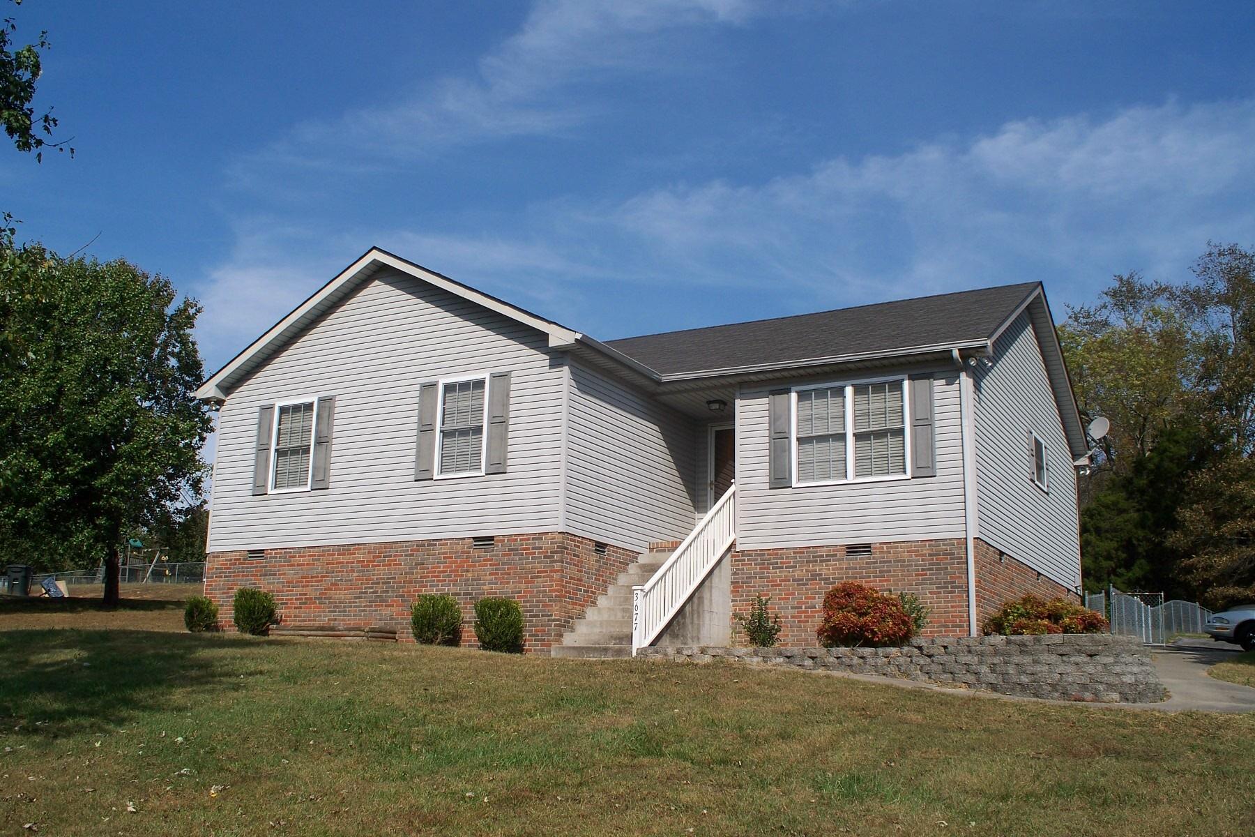 3677 Armstrong Road Springfield, TN 37172 - Photo 1 of 13 a front view of a house with a yard