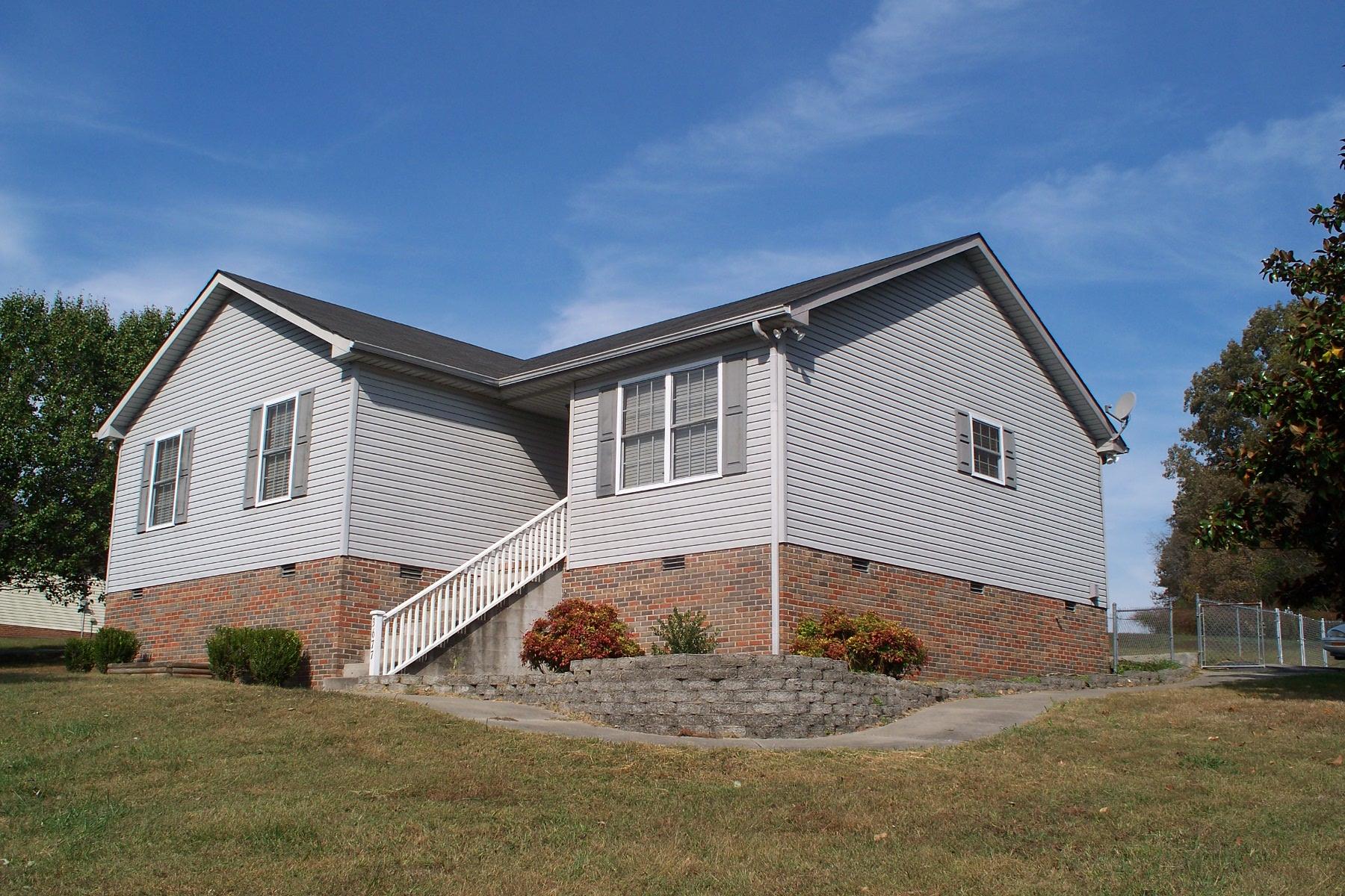 3677 Armstrong Road Springfield, TN 37172 - Photo 2 of 13 a front view of a house with a yard