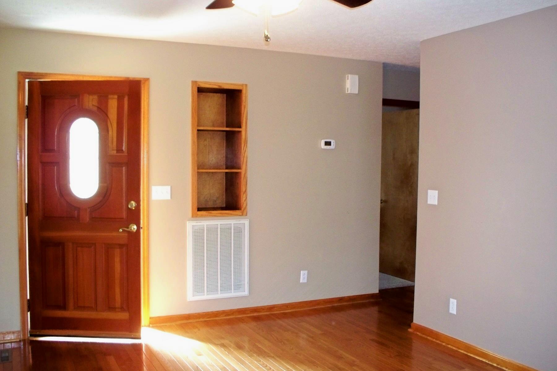 3677 Armstrong Road Springfield, TN 37172 - Photo 4 of 13 wooden floor and windows in a room