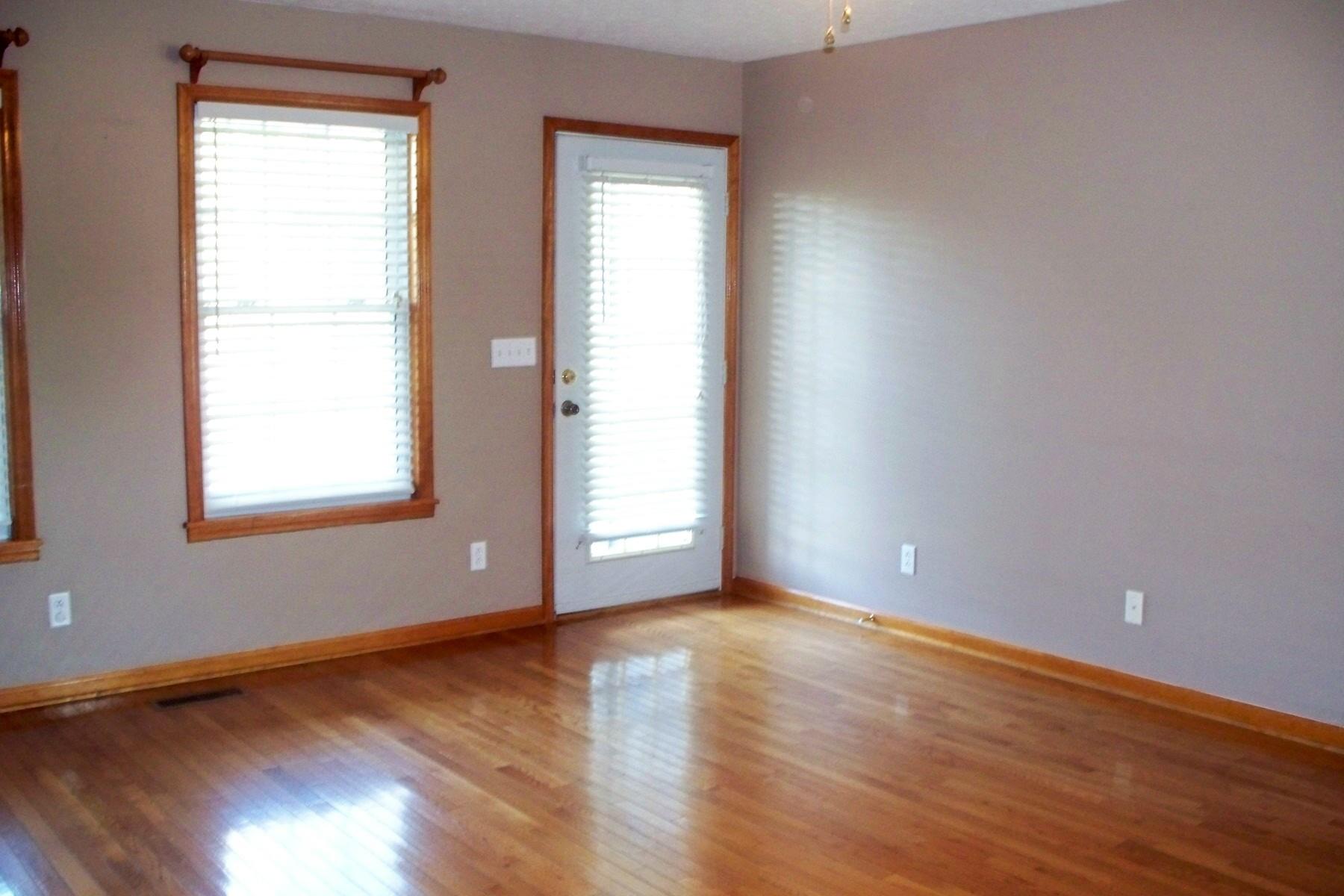 3677 Armstrong Road Springfield, TN 37172 - Photo 5 of 13 an empty room with wooden floor and windows