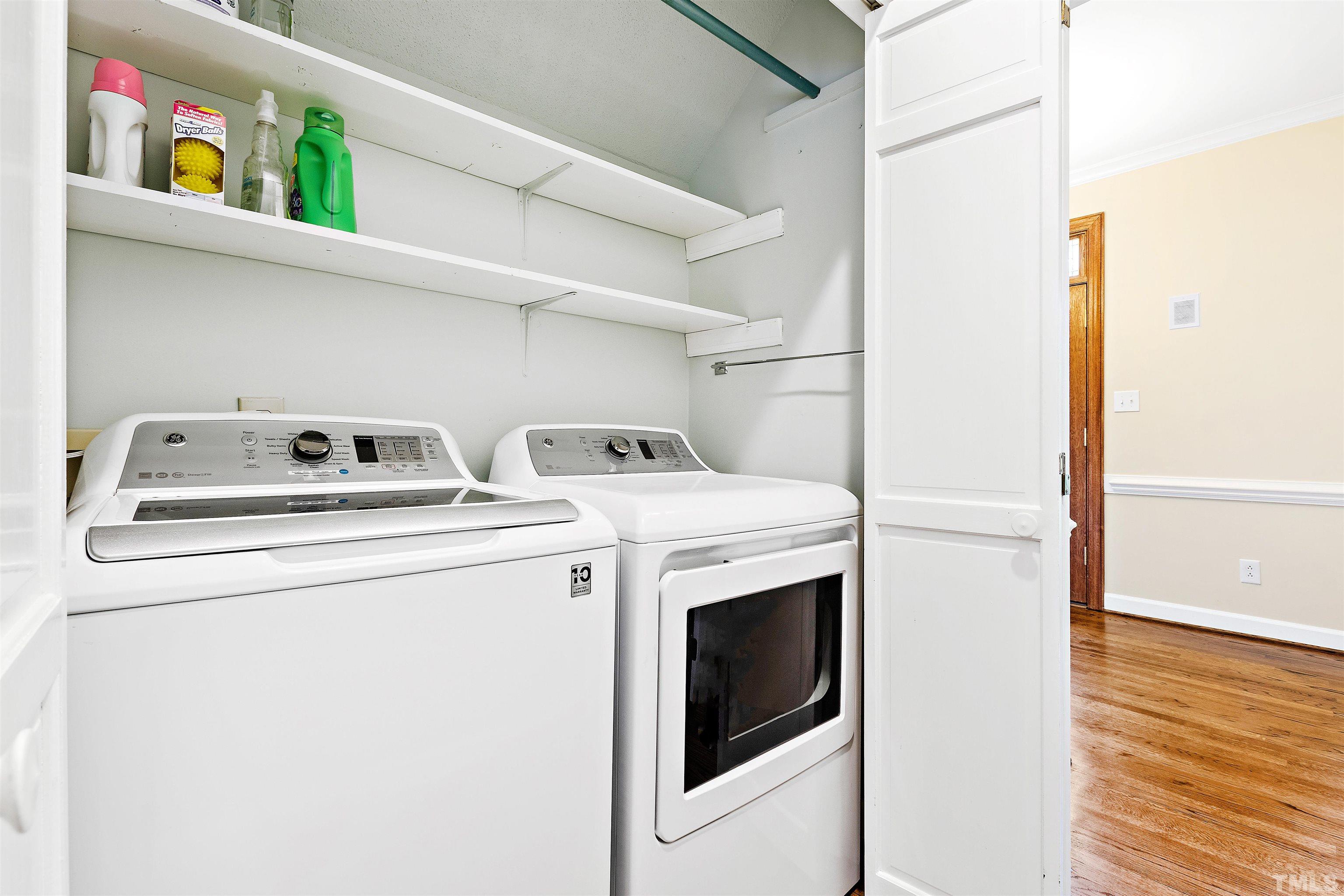 4708 Fallswood Place Raleigh, NC 27613 - Photo 20 of 45 a utility room with dryer and washer
