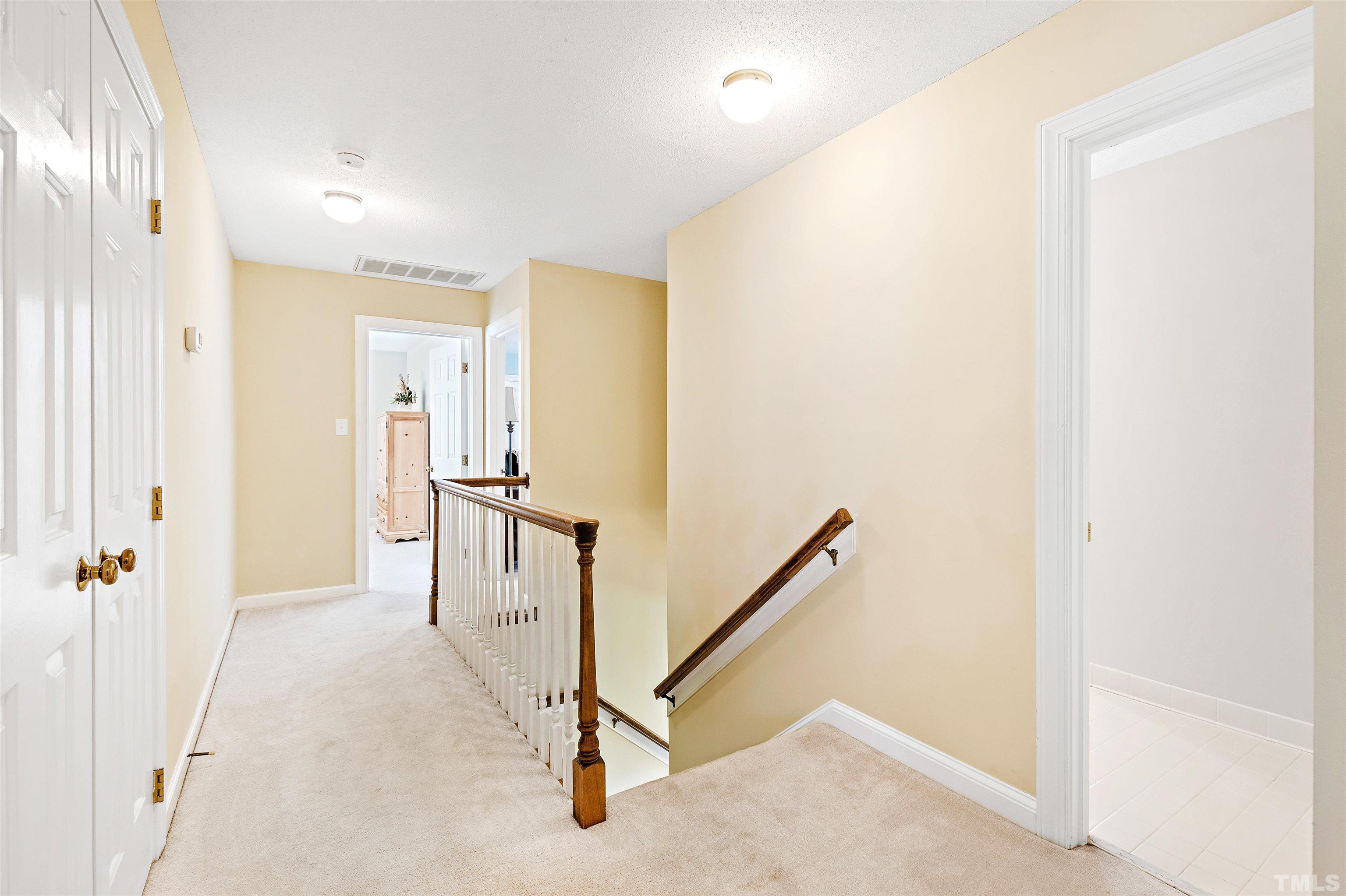 4708 Fallswood Place Raleigh, NC 27613 - Photo 22 of 45 a view of a hallway with closet