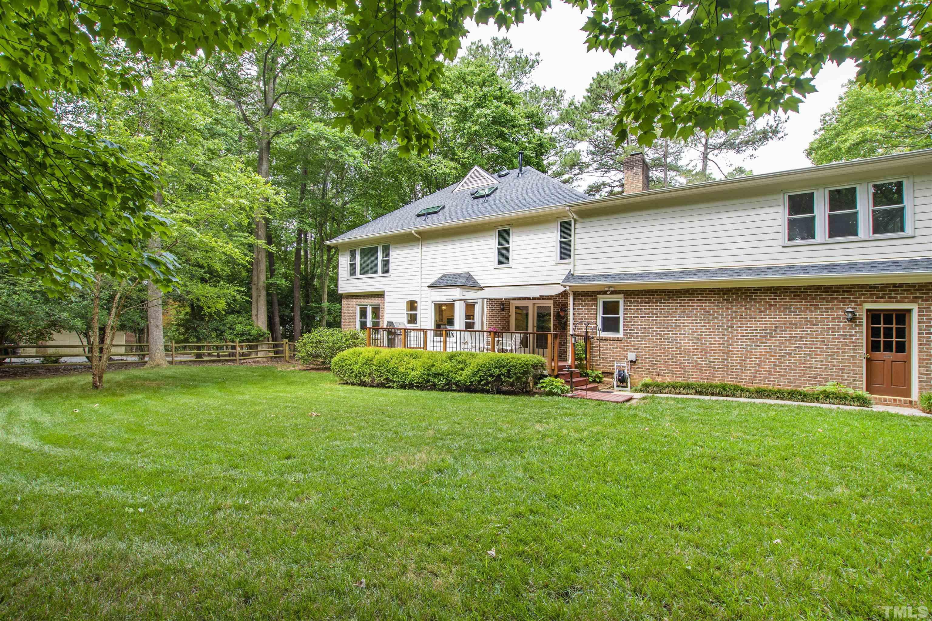4708 Fallswood Place Raleigh, NC 27613 - Photo 40 of 45 a front view of a house with a garden