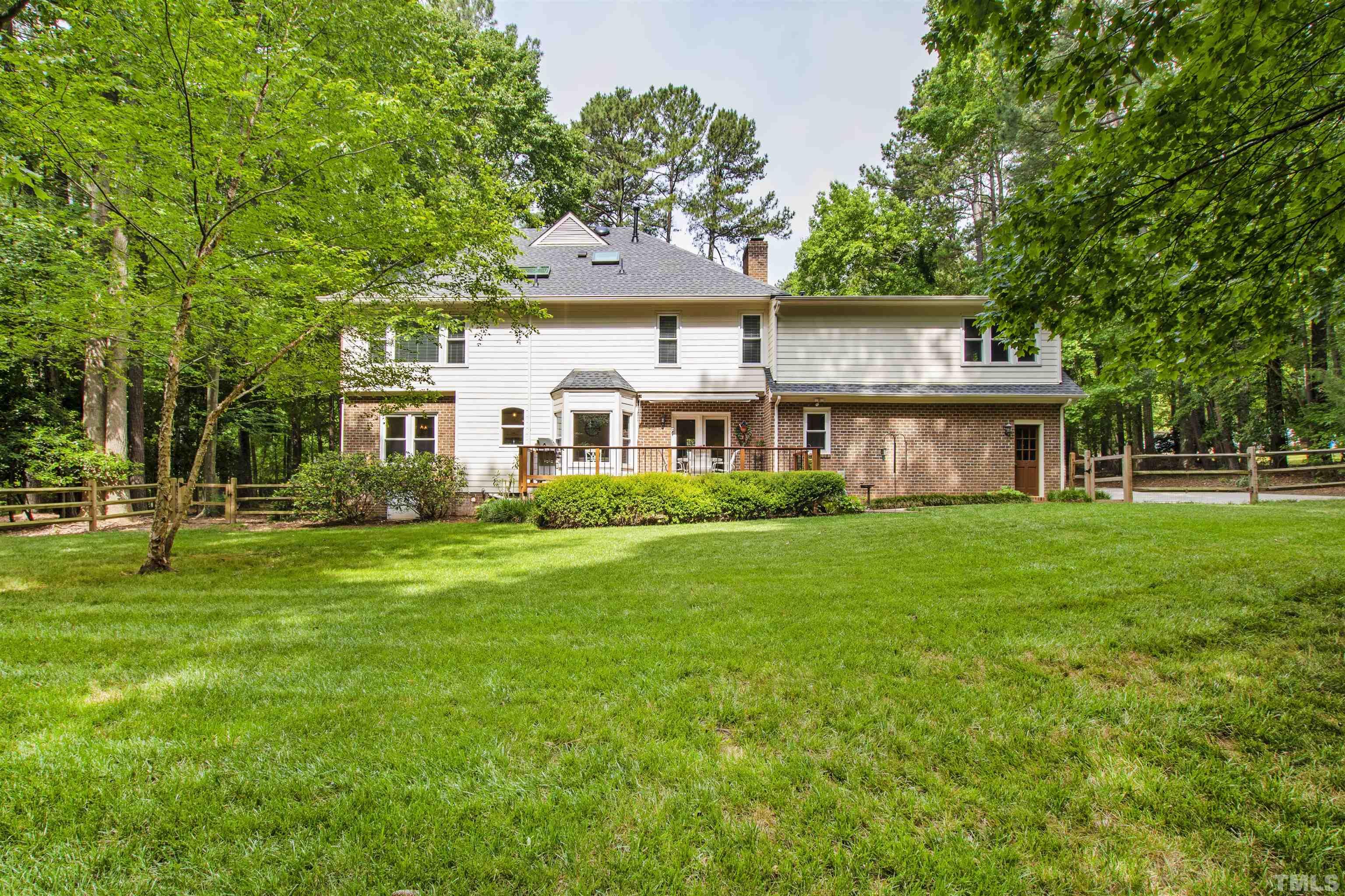 4708 Fallswood Place Raleigh, NC 27613 - Photo 41 of 45 a front view of a house with a yard