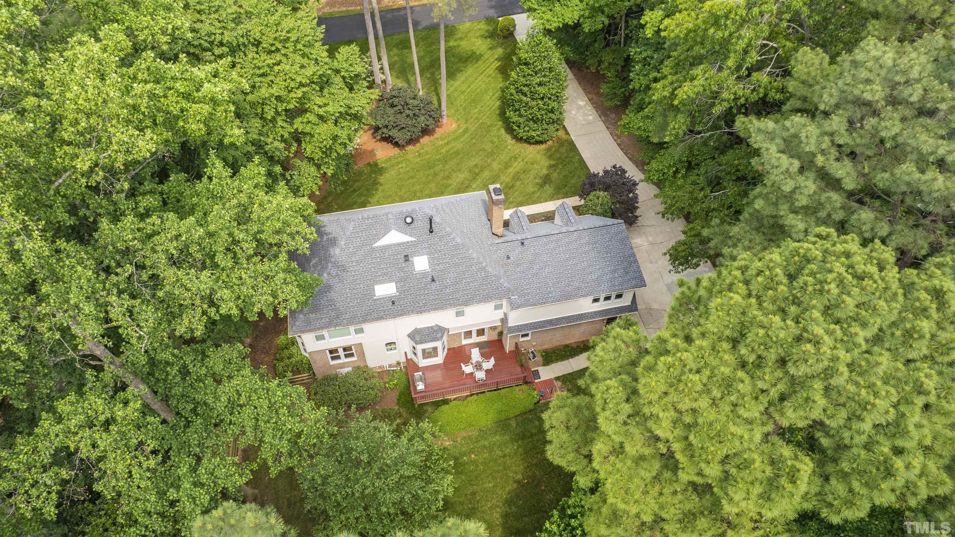 4708 Fallswood Place Raleigh, NC 27613 - Photo 44 of 45 an aerial view of a house with a yard