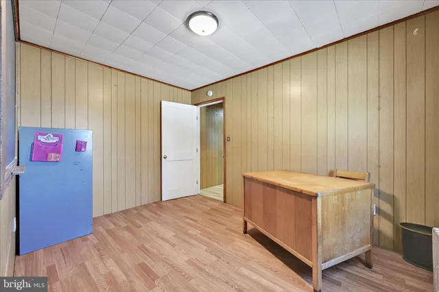 a view of house with a yard