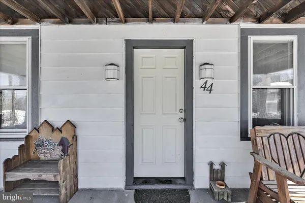 a stairs and a couch in a room