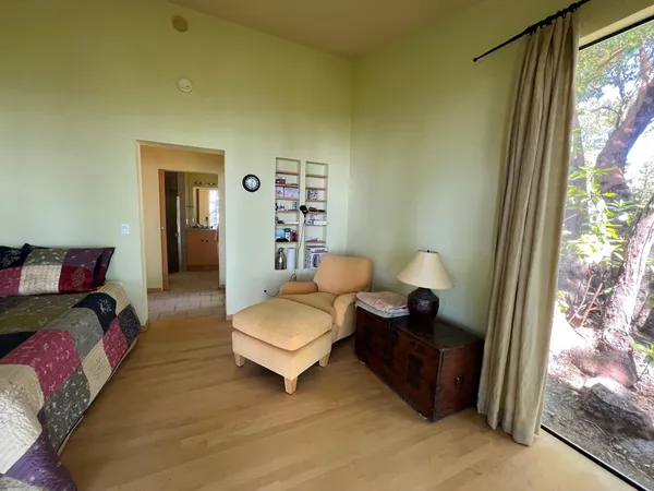 a view of a small yard from a balcony