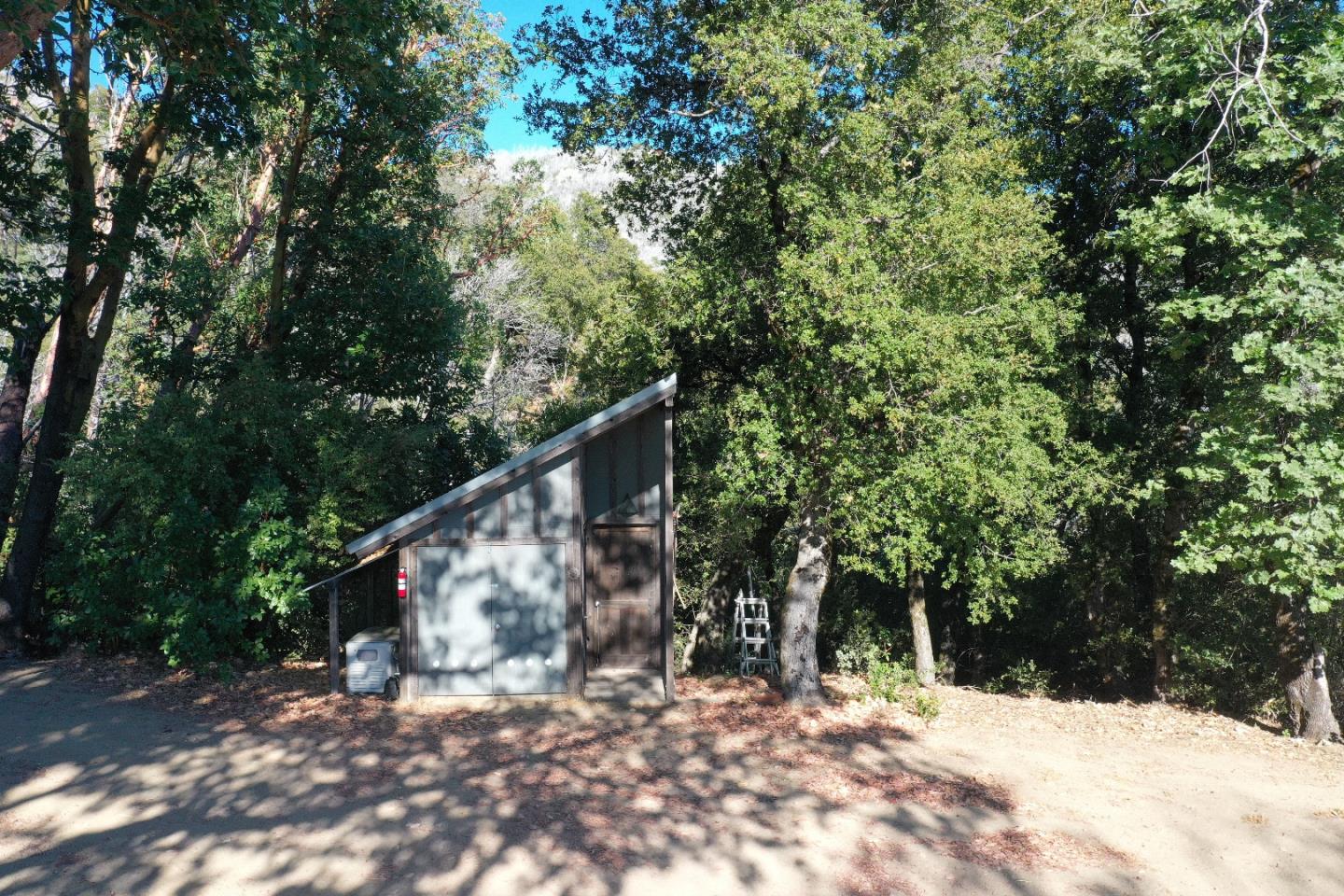 38875 Palo Colorado Road Carmel, CA 93923 - Photo 10 of 11 a view of a covered with trees in the background