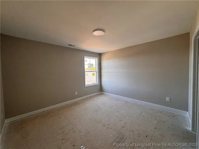 a view of an empty room with window
