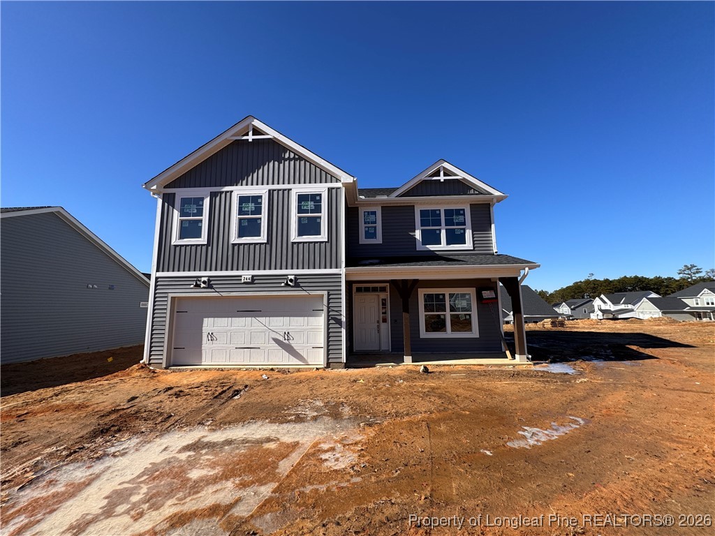 244 Rough Rdg Trail Aberdeen, NC 28315 - Photo 2 of 25 a front view of a house with a yard