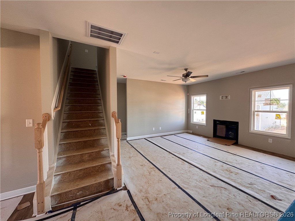 244 Rough Rdg Trail Aberdeen, NC 28315 - Photo 7 of 25 a view of kitchen and hallway with a window