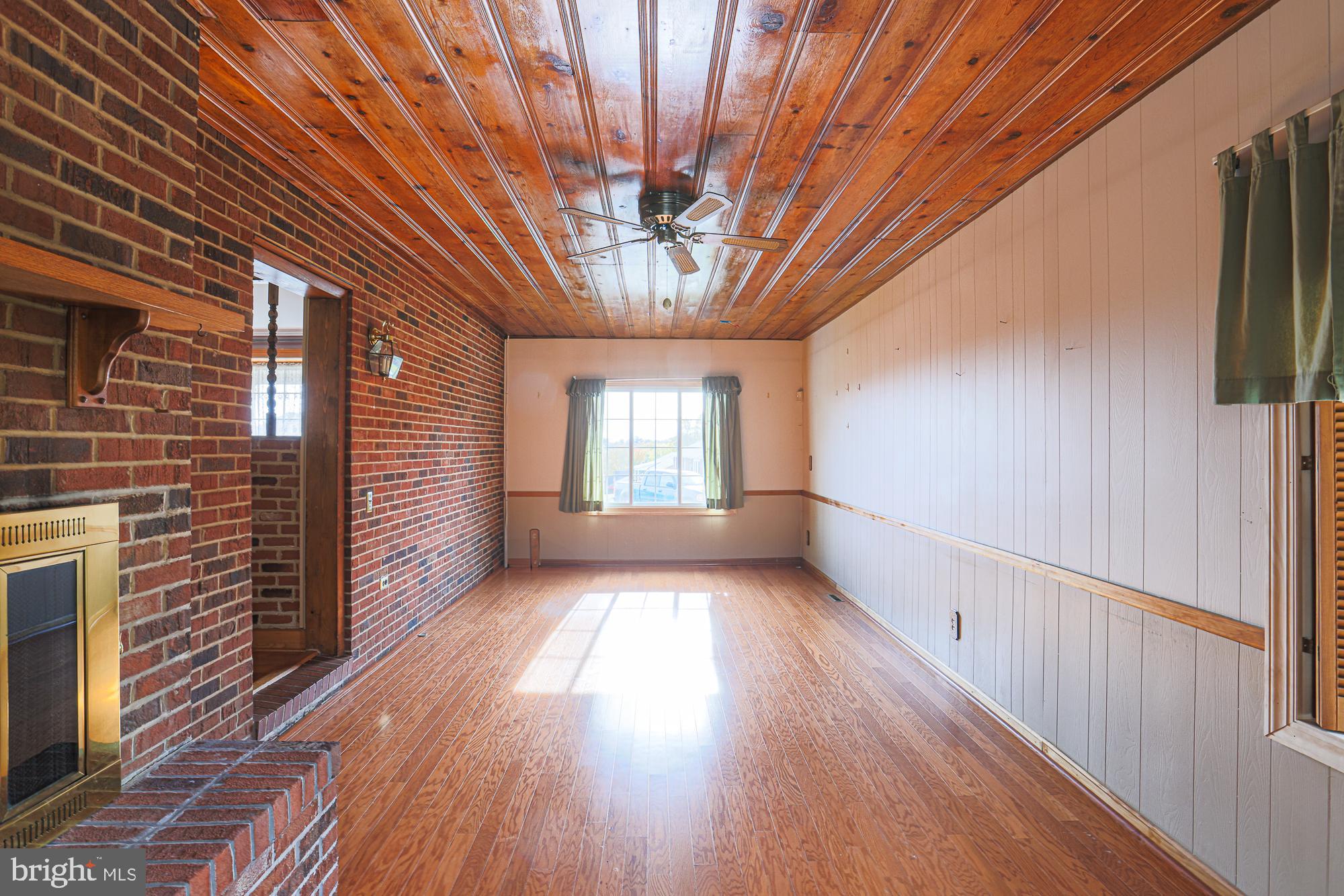 1522 Chivalry Court Rosedale, MD 21237 - Photo 15 of 36 a view of entryway with wooden floor