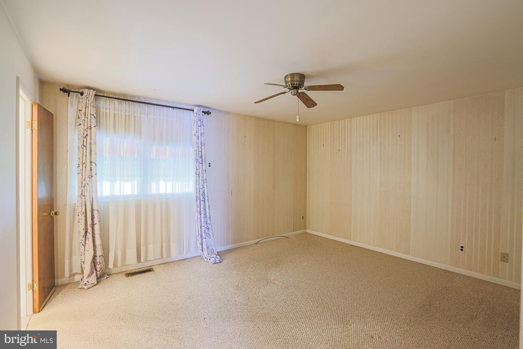 1522 Chivalry Court Rosedale, MD 21237 - Photo 16 of 36 a view of room with a ceiling fan