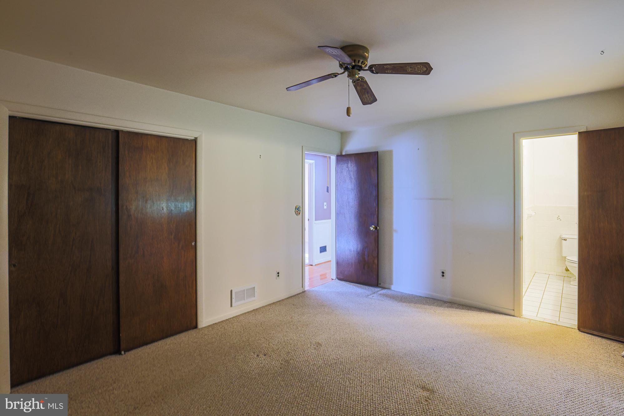1522 Chivalry Court Rosedale, MD 21237 - Photo 17 of 36 a view of empty room with ceiling fan