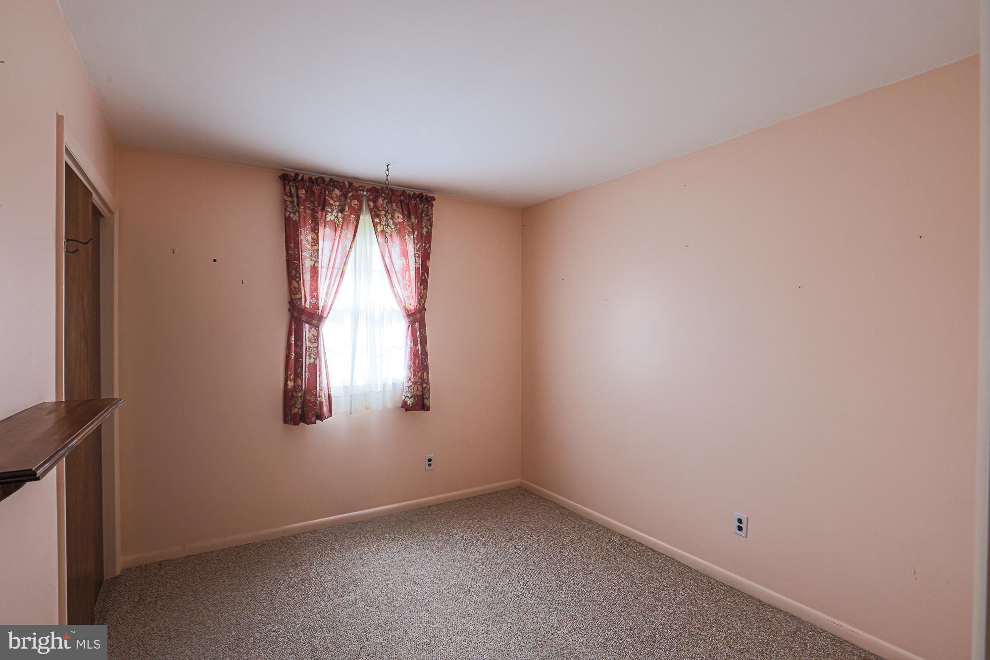 1522 Chivalry Court Rosedale, MD 21237 - Photo 20 of 36 a view of empty room with window
