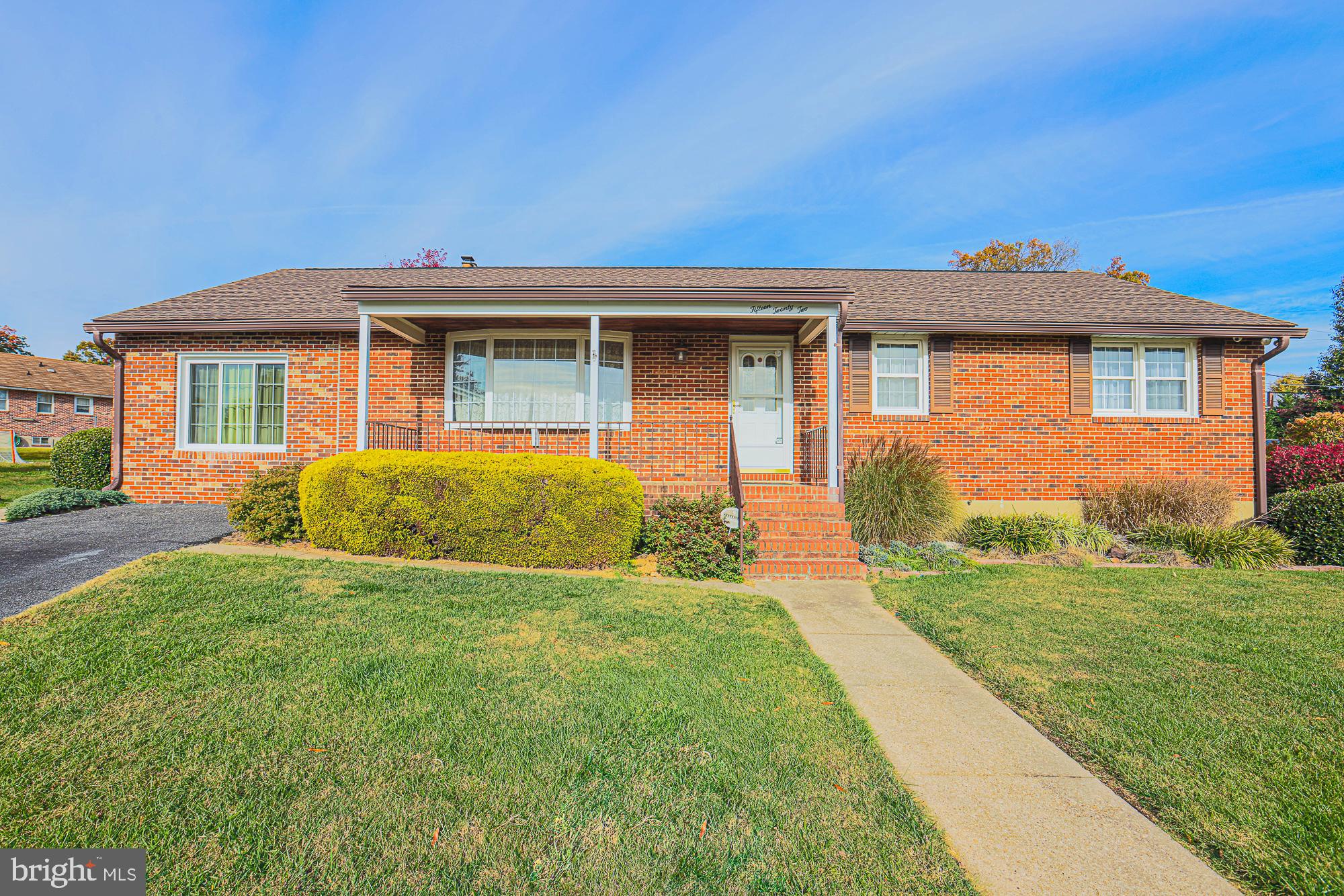 1522 Chivalry Court Rosedale, MD 21237 - Photo 2 of 36 a front view of a house with a yard